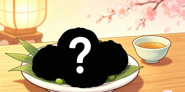東北地方の伝統的な和菓子です。茹でたての枝豆の皮を剥いてすりつぶし、砂糖と少々の塩を加えた鮮やかな緑色の「餡」を、つきたてのお餅にたっぷりと絡めた一品です。口に入れた瞬間に広がる豆の豊かな香りと自然な甘みは、夏から秋にかけての風物詩として愛されています。郷土の歴史が詰まったこの緑色の銘菓といえば何でしょうか？